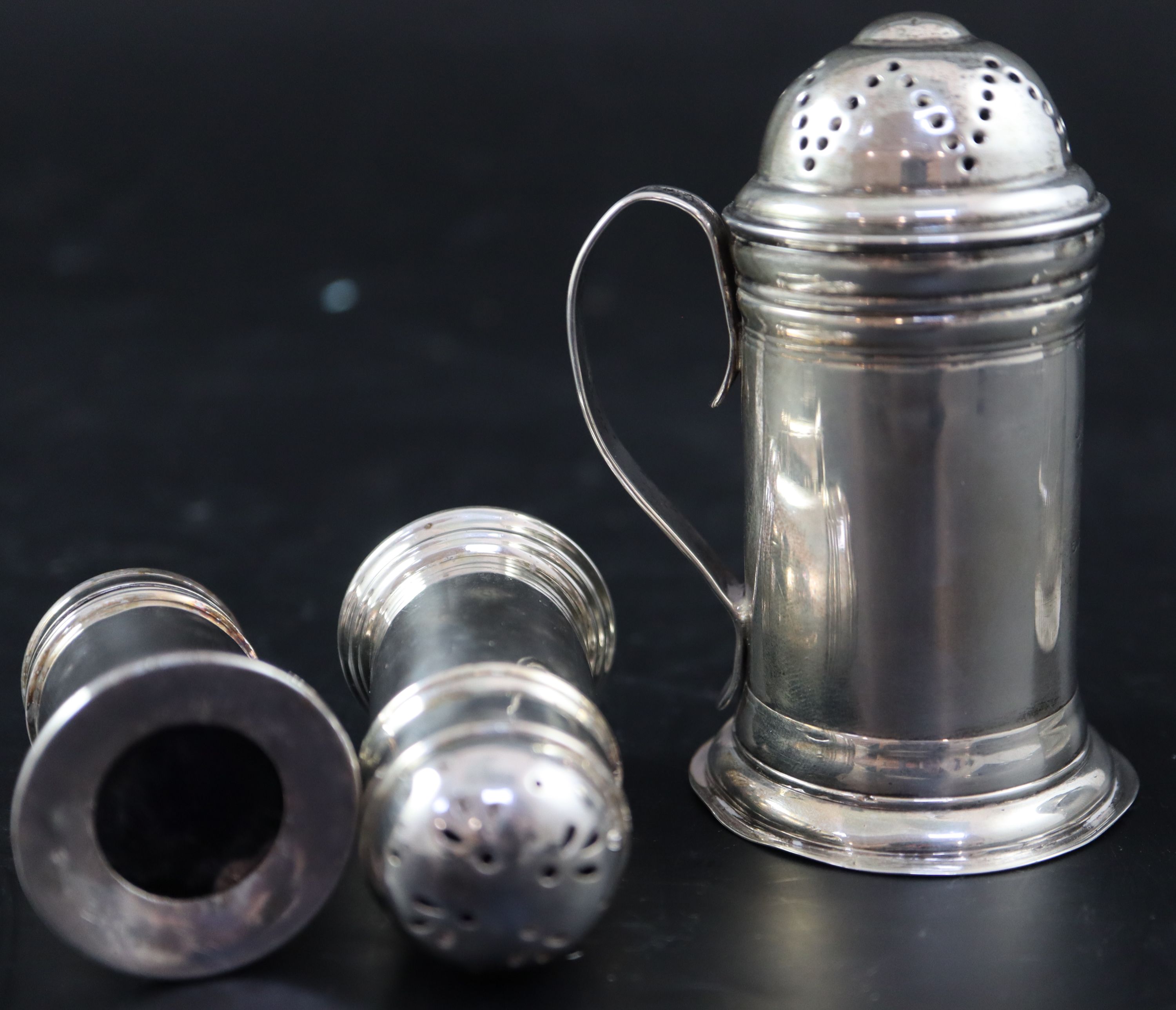 A George II silver kitchen pepper,